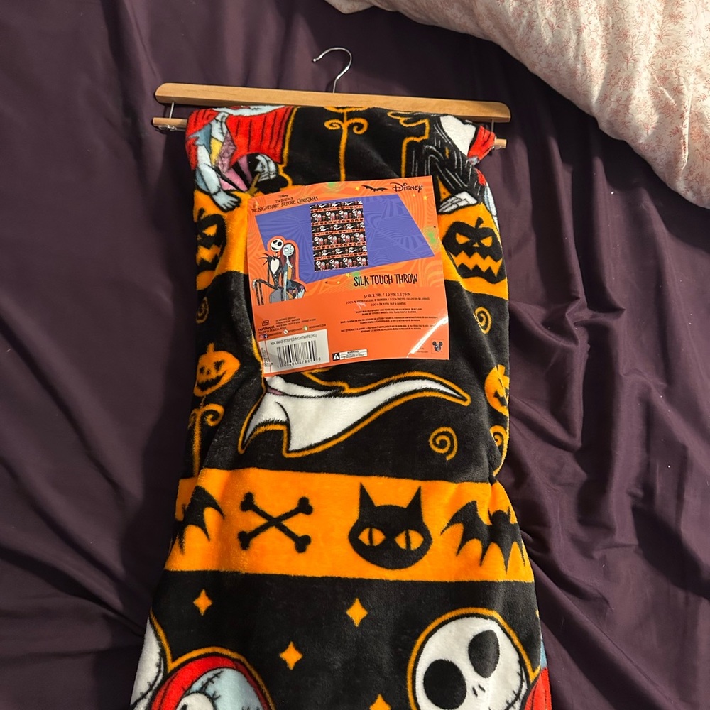 Disney nightmare before Christmas throw blanket new with tags.